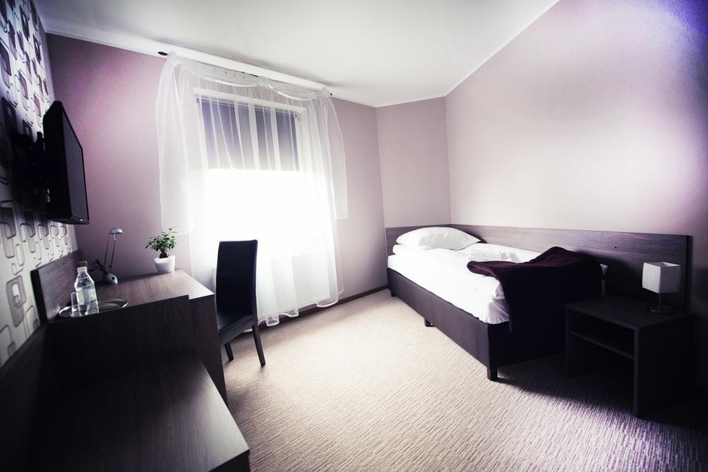 Makara Hotel Катовице Стая снимка